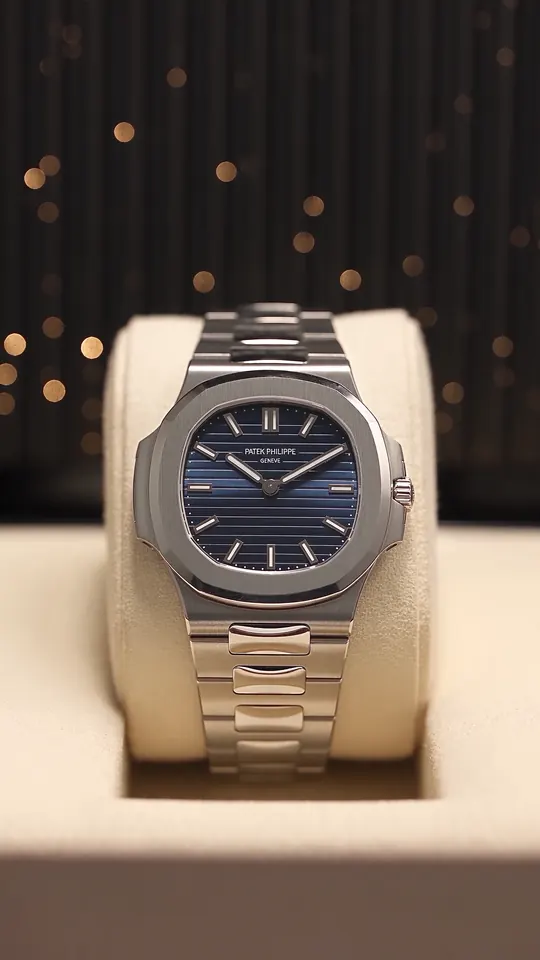 Patek Philippe watch presented on a cream watch pillow